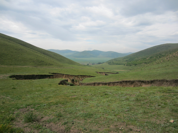 On the other side of the ridge we walked by a rill eroded by rain - Bashang Grasslands trip, August 2014