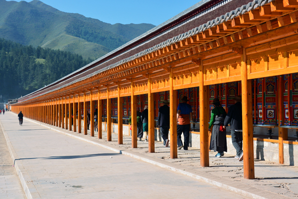 Prayer wheels in a long row - Xiahe, Labrang Monastery, and the Zhagana area in southern Gansu, September 2016