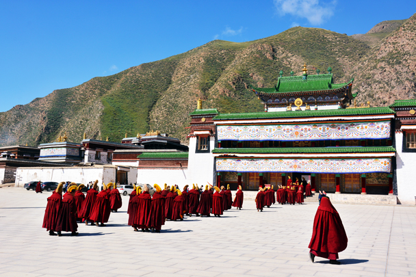 Monks heading in to the prayer hall - Xiahe, Labrang Monastery, and the Zhagana area in southern Gansu, September 2016