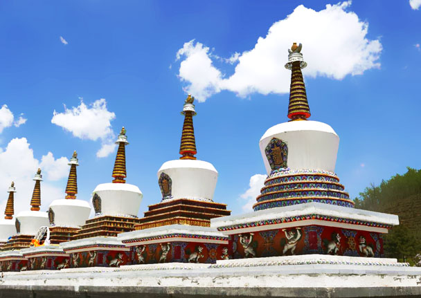 The famous eight white pagodas represent the eight merits of Buddha - Qinghai Lake, Kumbum Monastery, and the Gangshika Snow Mountain, Qinghai Province, 2017/05