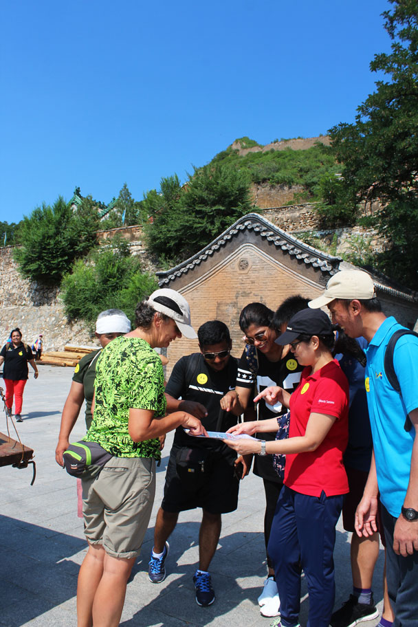 Discussing where to go next - Teambuilding for Merck with Great Wall hike and treasure hunt, 2017/7/7