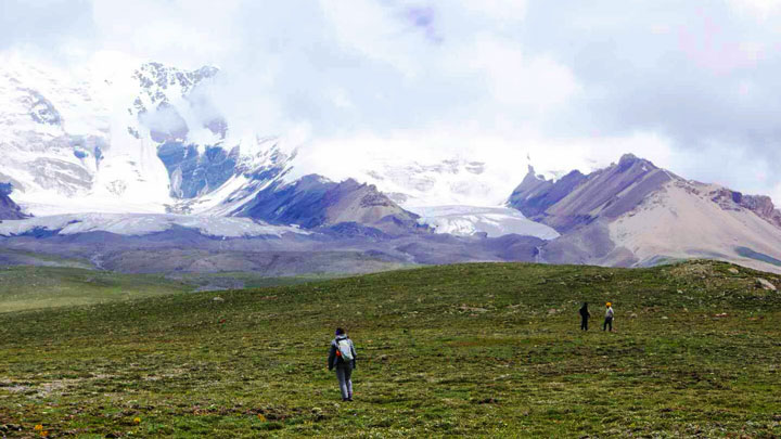 Grasslands below the peaks of Amne Machin Snow Mountain