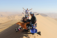 Hikers in the desert, Badain Jaran Desert and Zhangye Danxia Landform, 2013/09