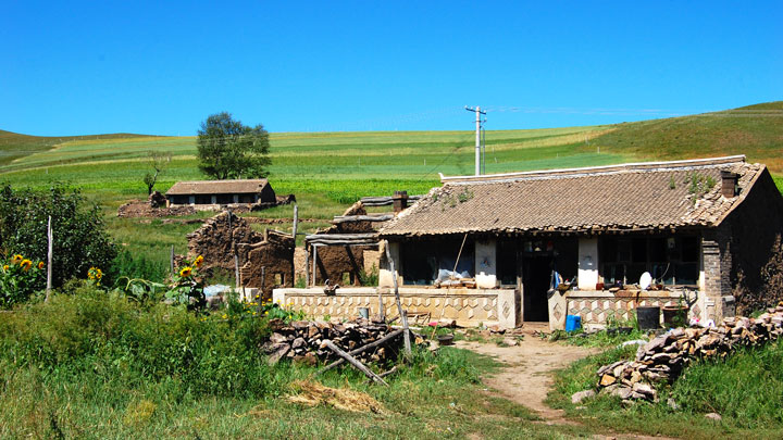 A farmhouse in the grasslands