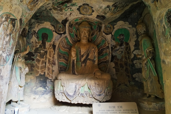 A buddha statue in a niche