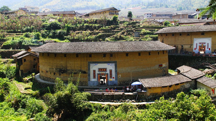 Looking over to the entrance of one of the tulou