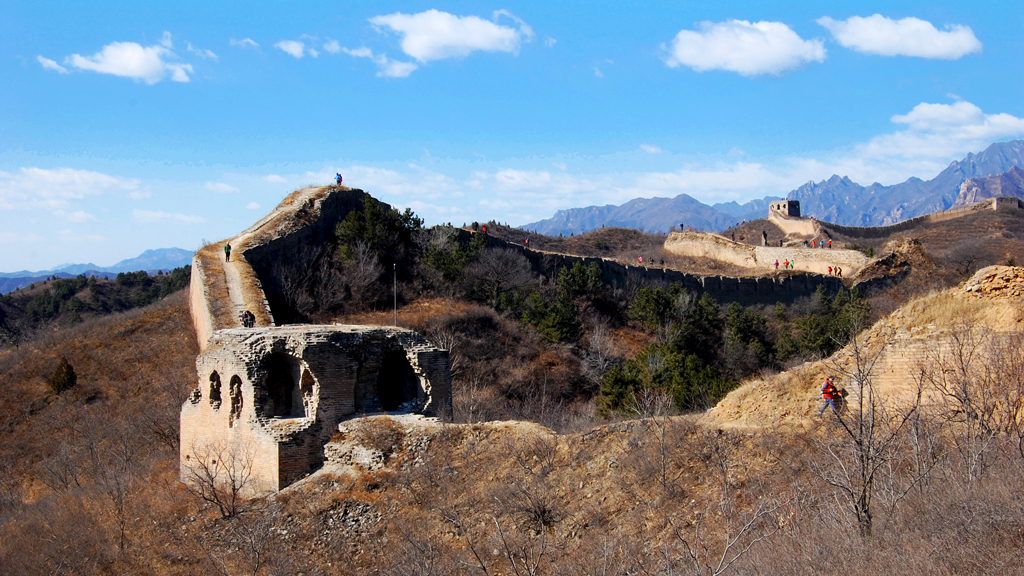 Hiking by a tower on the Great Wall at Gubeikou