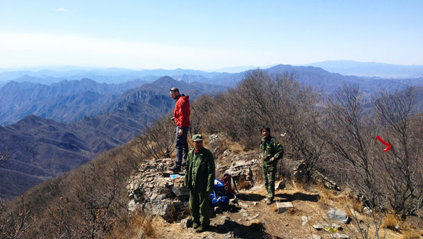 Hikers on the peak of Heituo Mountain
