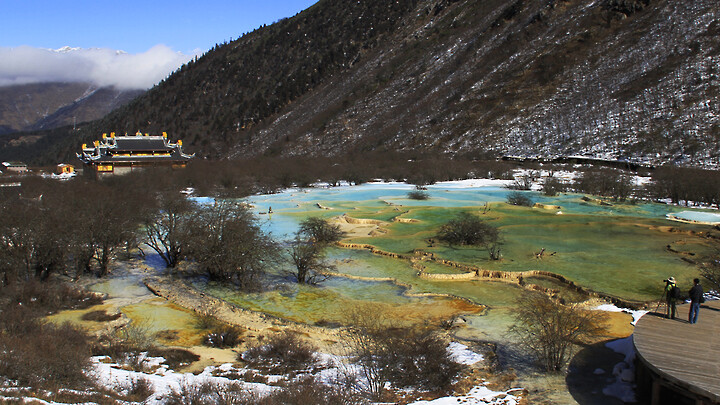 Travertine terraces behind Huanglong Temple, high up in the mountains