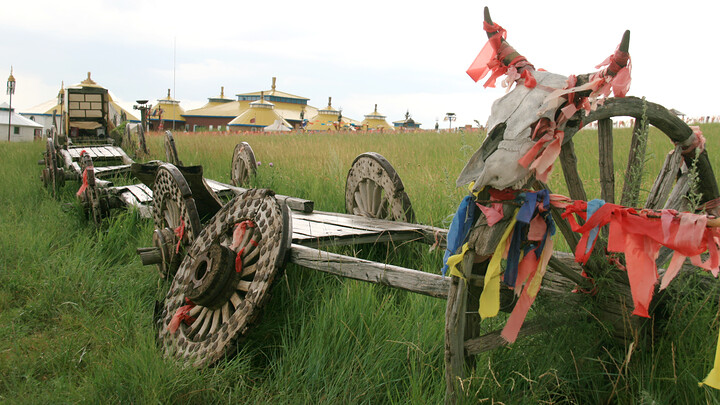 Carriages behind a yurt-style hotel