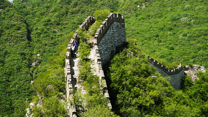 Hikers inching down rough 'wild' Great Wall on the Nine-Eyes Tower hike