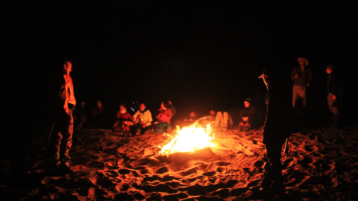 Around a bonfire at our campsite in the desert